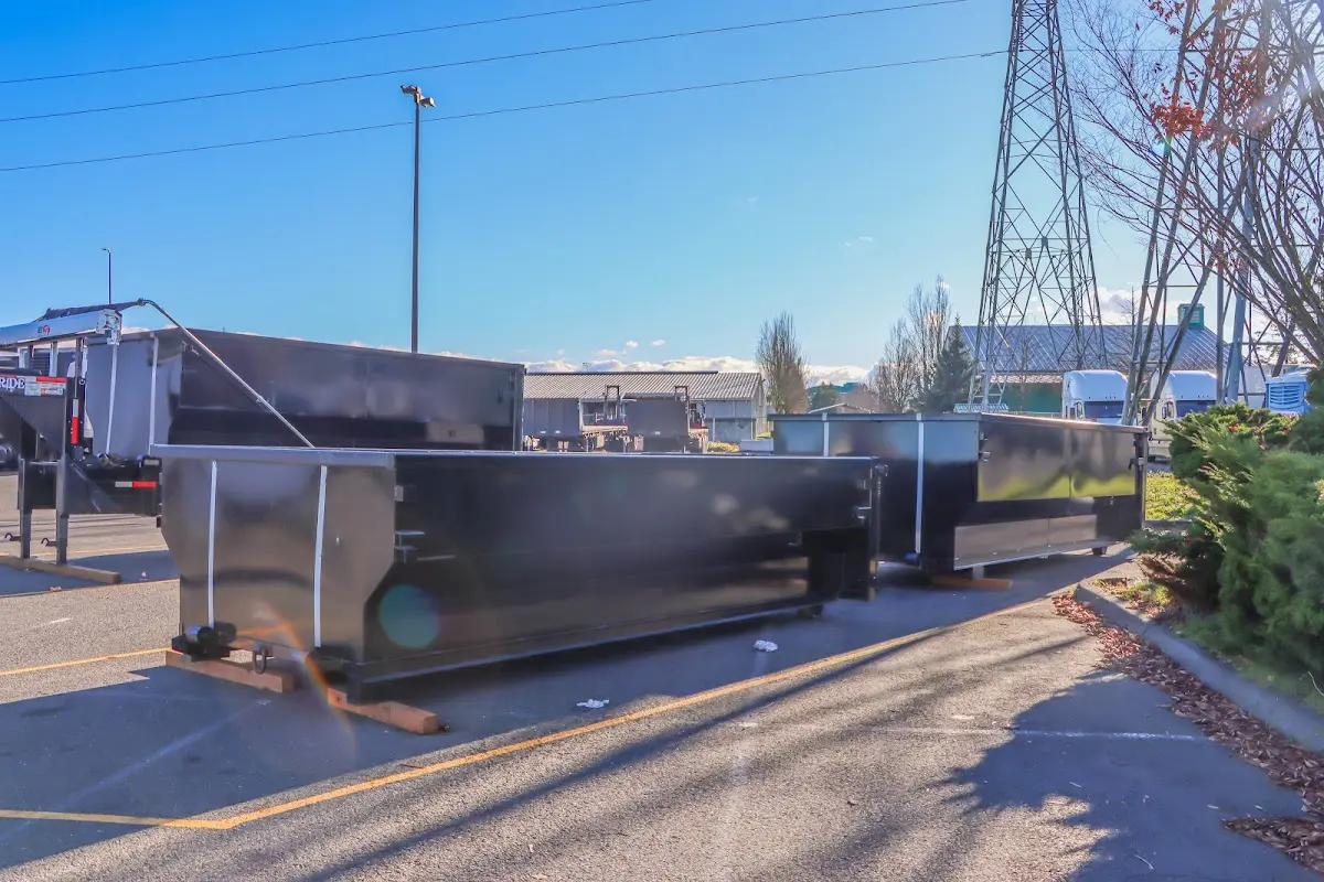 Roll-off dumpster ready for waste disposal at job site for 4 Yard Dumpster Rental in Bailey's Crossroads